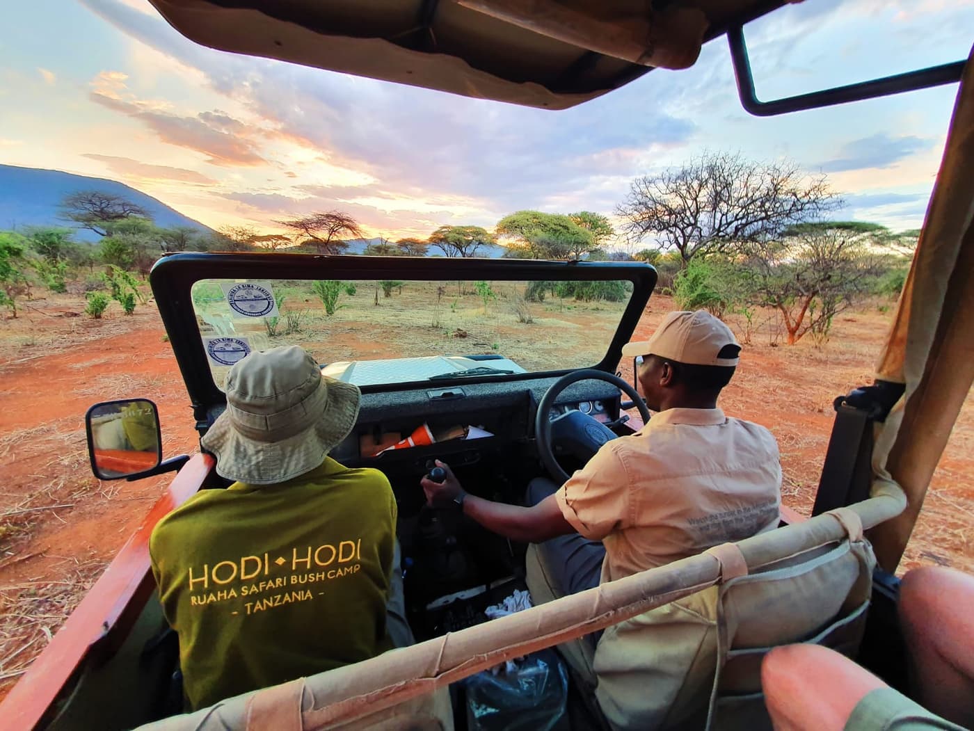 An evening game drive heading out at sunset