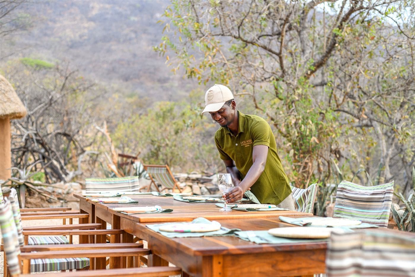 The table being set for dinner outdoors